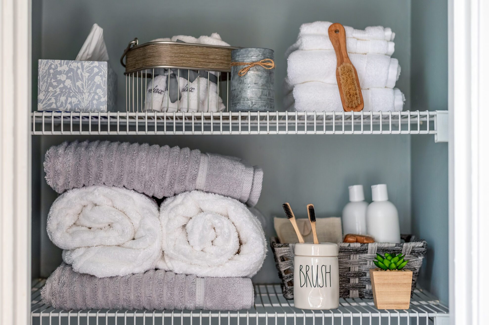 Neatly organized bathroom linen closet