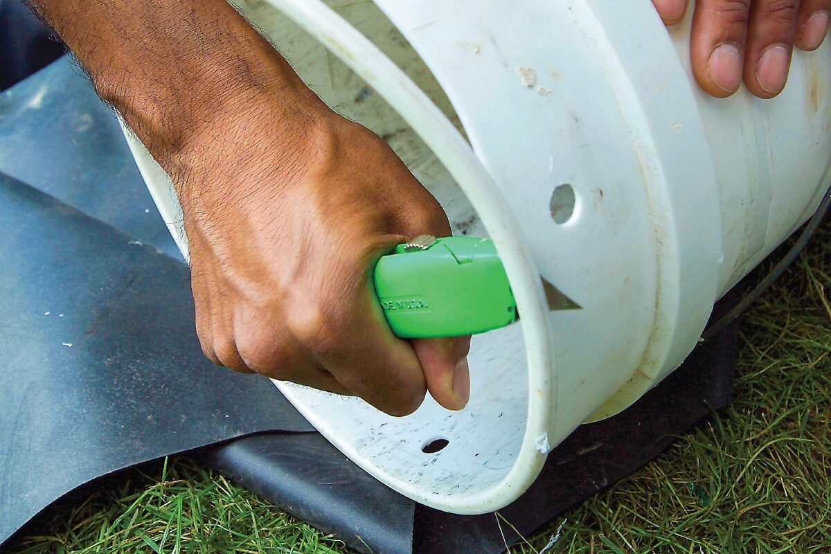 How To Build A Water Feature Thats Low Maintenance Cut the Rim off the Bucket