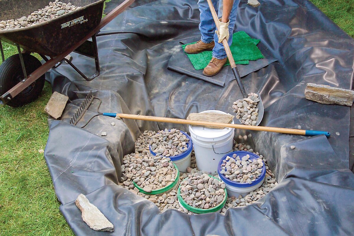 How To Build A Water Feature Thats Low Maintenance Spread Gravel Around the Buckets