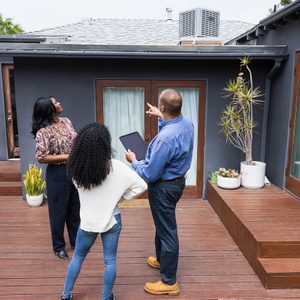 real estate agent with homebuyers