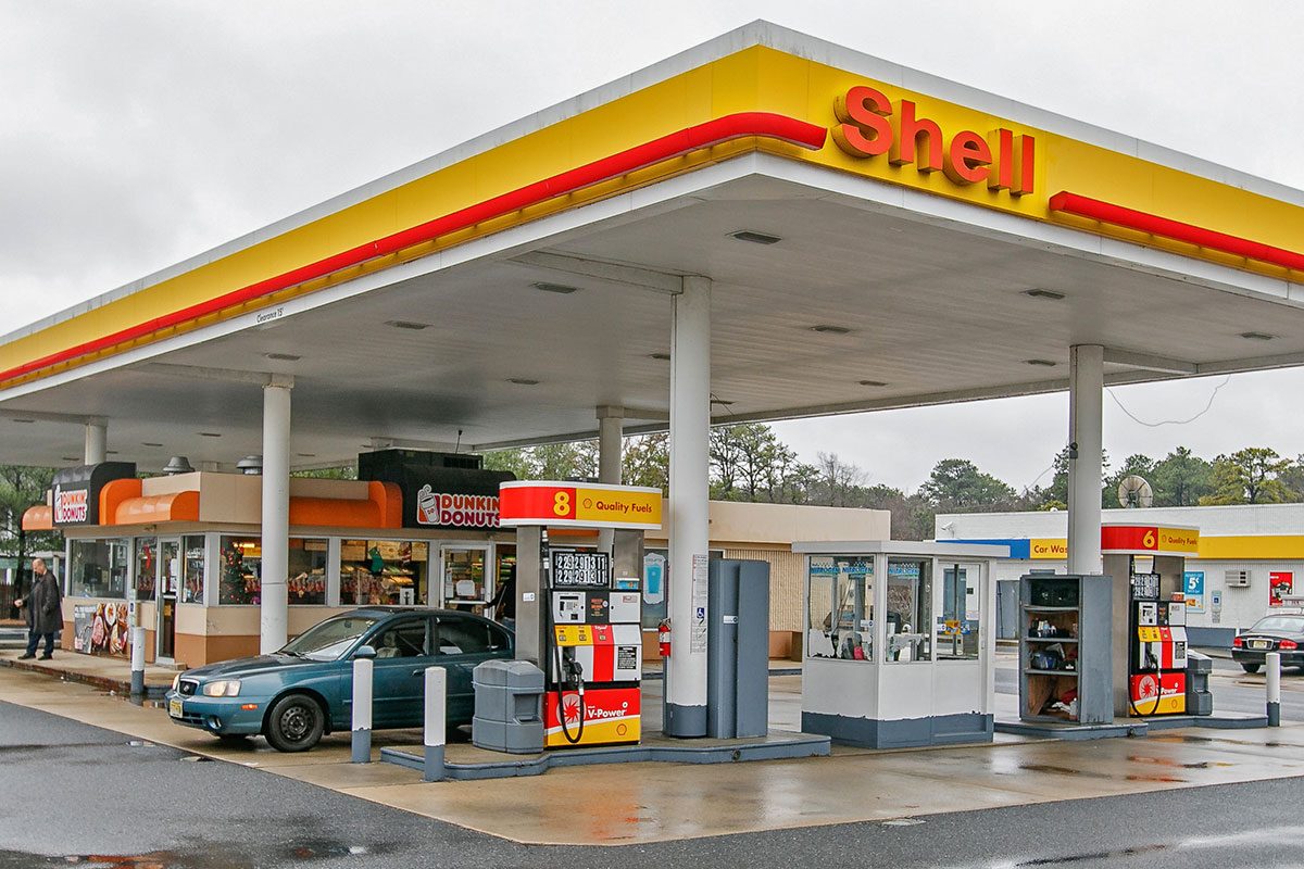 Shell gas station is seen on a cloudy day.