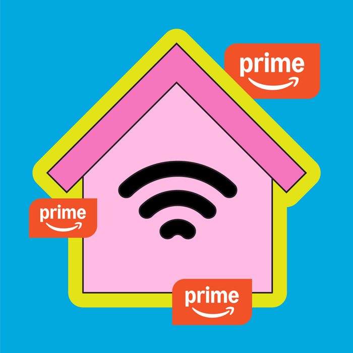 Amazon Prime Day Smart Home Sales graphic on blue background with a pink house with a wifi symbol and prime logo around the illustration