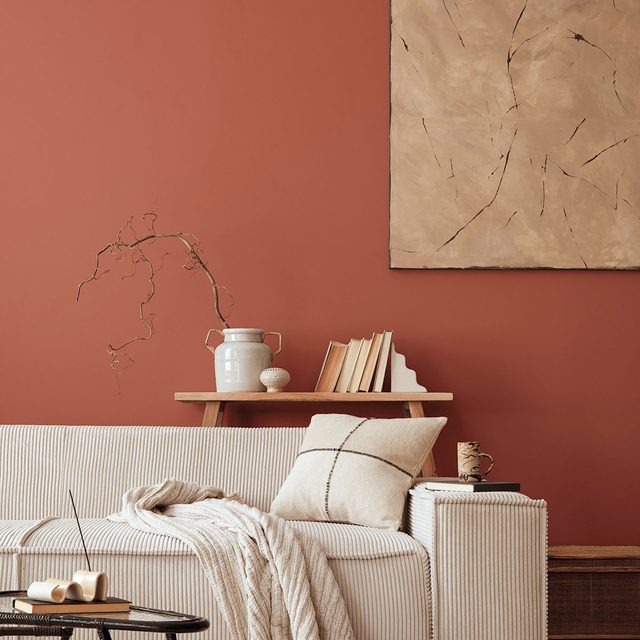 Living room's closeup with Clark + Kensington&rsquo;s 2026 Color Of The Year paint on wall