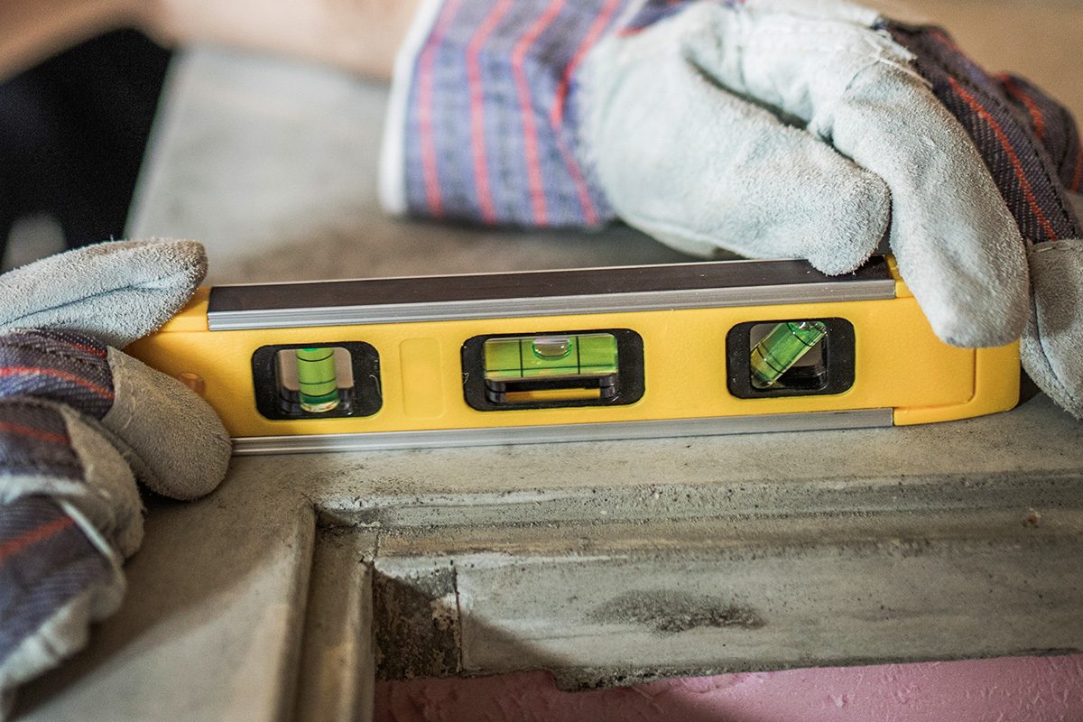Close up of using level on a construction site