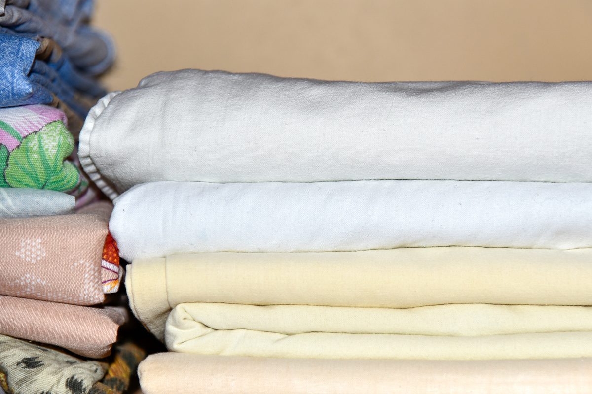 close up of linens on a shelf