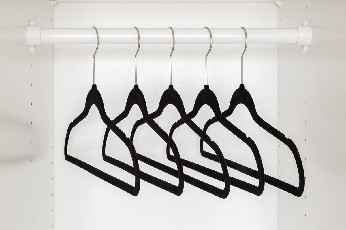 velvet hangers in a closet