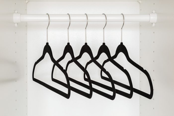 velvet hangers in a closet