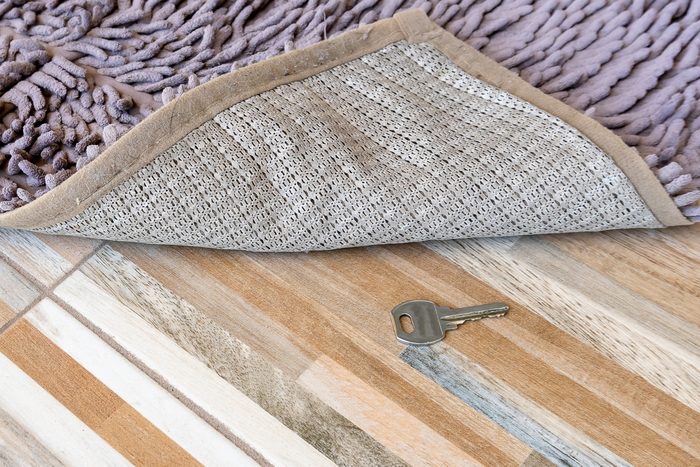 spare key under welcome mat