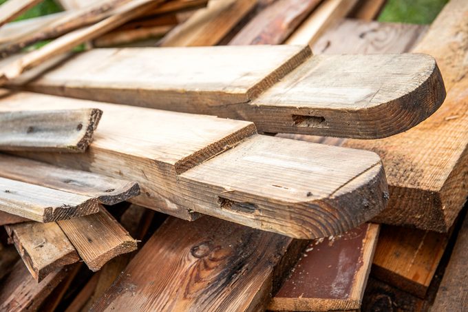 Close-up of remnants of old boards and building materials.