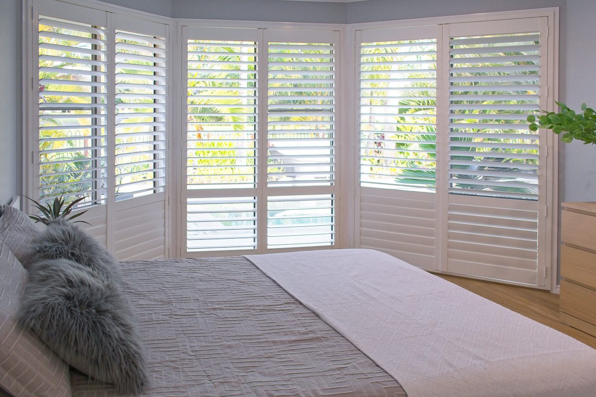 plantation shutters in a bedroom