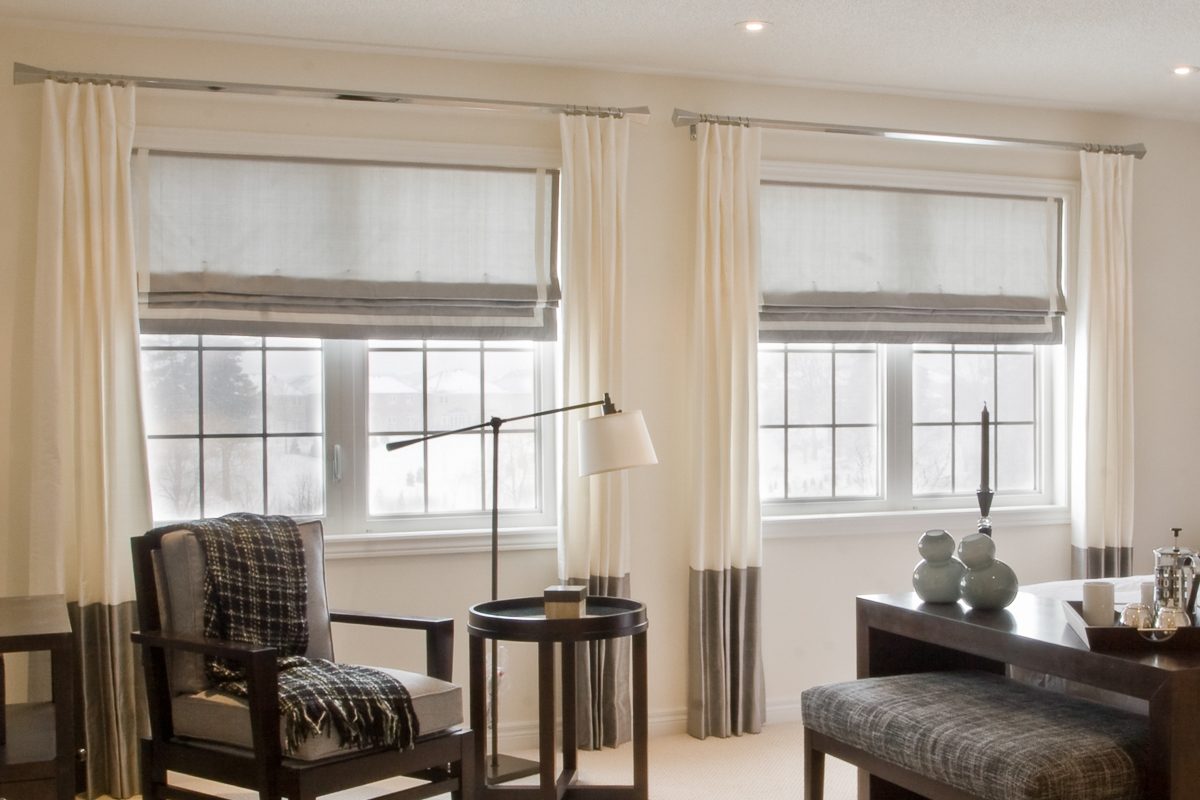 window shades with curtains in a modern bedroom