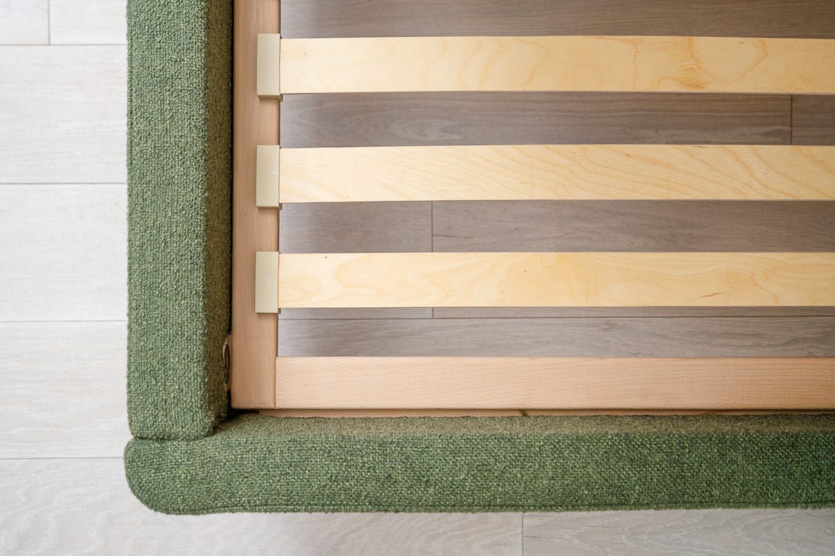 strips of plywood screwed lengthwise under a sofa